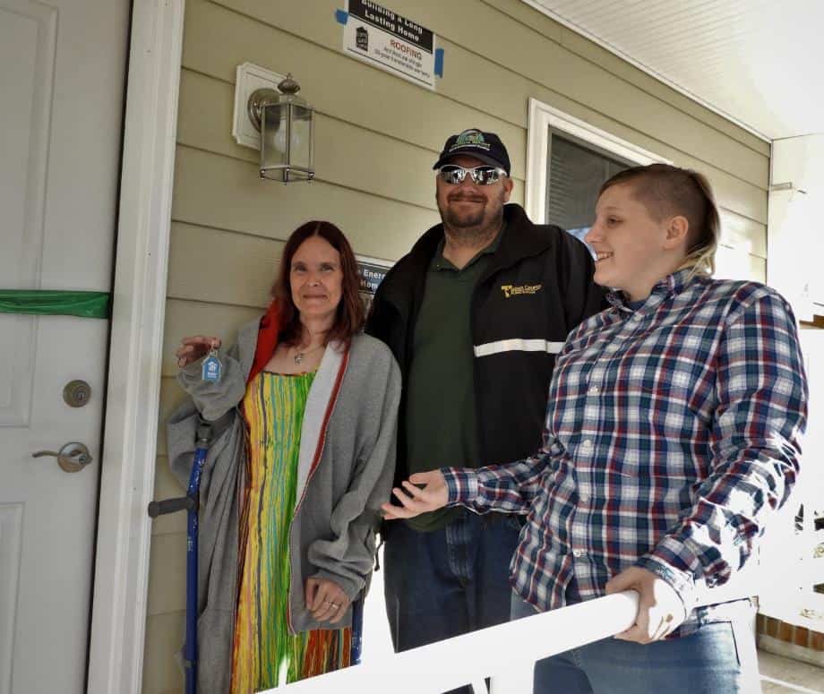 Everyone deserves a decent place to call home; the Hoffs now have just that! Pictured above is the family with the keys to their new home.